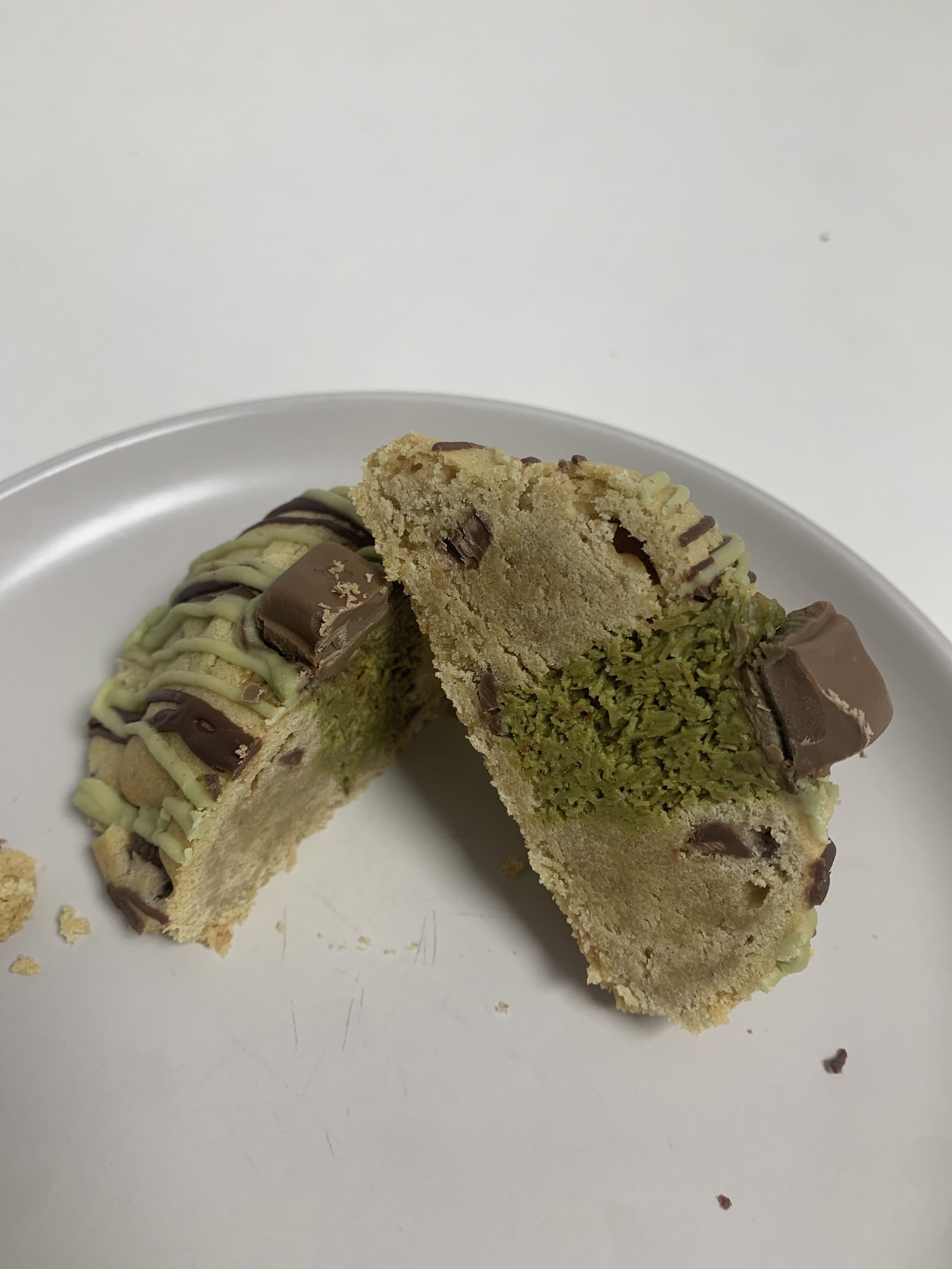 A stuffed cookie cut in half to show its centre